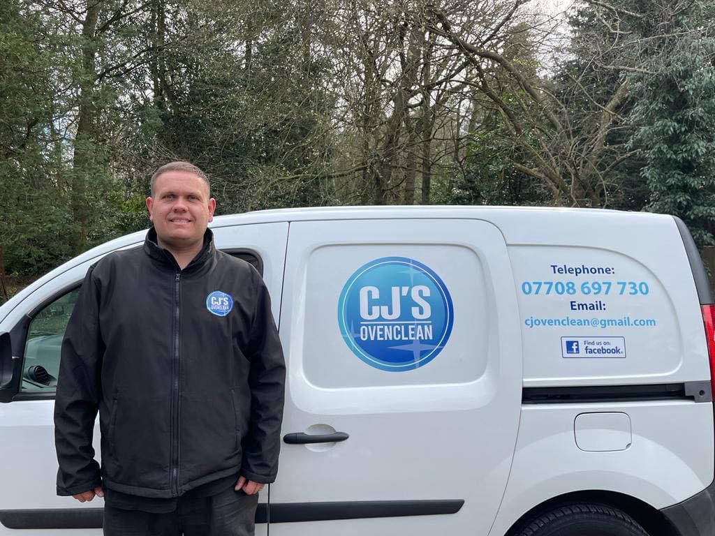 Craig from CJ's Oven Clean standing by his van